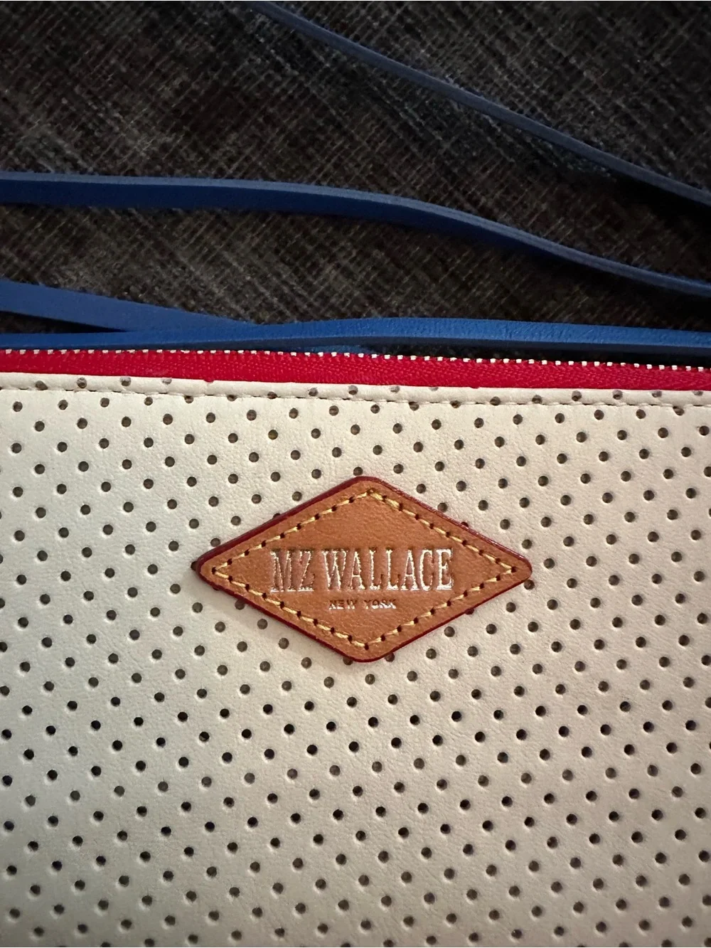 MZ Wallace White Perforated Zip Wallet with Blue and Red Accents. Rare